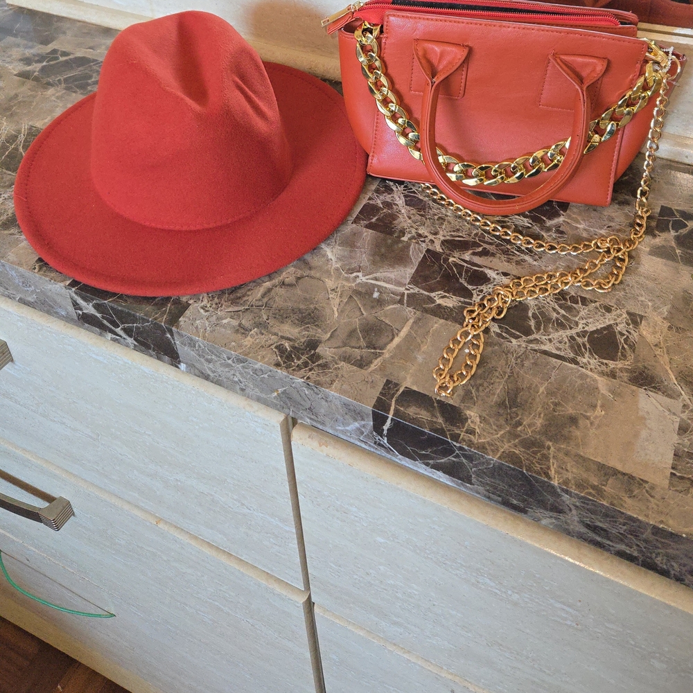 Elegant Red Women's Hat with Gold Chain Accent
